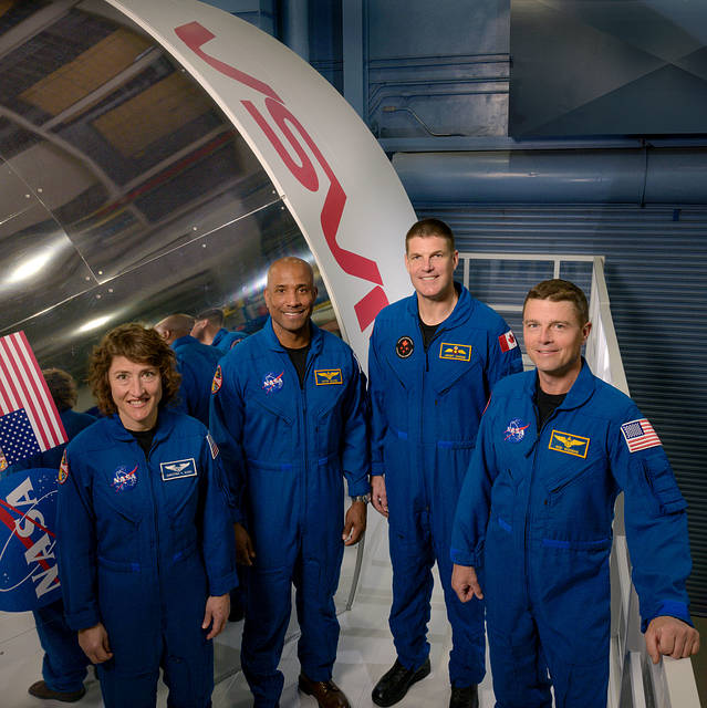 Artemis II Crew Announcement products and still images of crew in Building 5s Orion Simulator.